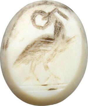 obverse: ROMAN JASPER INTAGLIO Jasper intaglio, engraved with eagle holding wreath in the beak. Roman period, 1st century BC-1st century AD. 13 x 11 mm