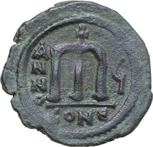 reverse: Tiberius II Constantine (578-582). AE Follis. Constantinople mint, 4th officina. Dated RY 5 (AD 578-579)