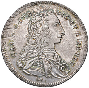 obverse: Napoli. Carlo di Borbone (1734-1759). Piastra da 120 grana 1750 AG gr. 25,26. P.R. 29a. MIR 337/1. Magliocca 141. Rara. Patina iridescente, SPL