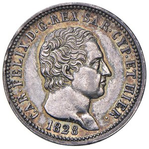 obverse: Carlo Felice (1821-1831) Lira 1828 G - Nomisma 594 AG Leggermente lucidata al D/ probabilmente per rimuovere una intensa patina, colpetto al bordo, comunque un piacevole esemplare. SPL+