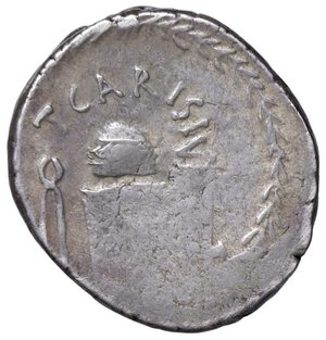 reverse: Carisia - T. Carisius - Denario (46 a.C.) Testa di Giunone Moneta a d. -  R/ Strumenti per battere moneta in corona d’alloro - Cr. 464/2 AG (g 3,84). BB