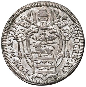 obverse: Roma - Innocenzo XI (1676-1689) Testone 1684 an. VIII - D/ INNOCEN XI - PON M A VIII, stemma oblungo a piede sinistrorso, sormontato da chiavi decussate con cordone e fiocco, e tiara radiante R/ MELIVS / EST DARE / QVAM / ACCIPERE / 1684, in cartella a targa con fogliami e ricci - MIR 2035/21 Munt. 75 Ag 9,11 g. SPL