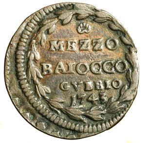 reverse: GUBBIO. Benedetto XIV (1740-1758) Mezzo baiocco 1743/ IV (g. 6,39) Stemma R/ conchiglia / MEZZO / BAIOCCO/ GVBBIO / 1743 in ghirlanda.   CU    RARO    +BB