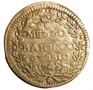 reverse: GUBBIO. Benedetto XIV (1740-1758) Mezzo baiocco 1748/ VIII (g. 7,01) Stemma R/ stella / MEZZO / BAIOCCO/ GVBBIO / 1748 tra rami.   CU    RARO    +BB