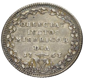 reverse: Roma. Stato Pontificio. Clemente XIII (1758-1769). Giulio 1763. Ag (2,58 g). D/ stemma ovale. R/ OBLECTAT IVSTOS MISERICOR DIA 1763 in corona di alloro. MIR 2715. SPL 