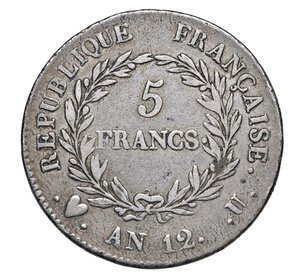 reverse:  NAPOLEONE I, Primo Console  (1802-1804)  5 Franchi An 12 (1803-1804)  U, Torino   Pagani 8   Mont. 13 (R5)   Gig. 1   Ag   24,78 g   37,6 mm   RRRR   Ex Negrini 34/1173; In quaranta anni di aste pubbliche della ditta Varesi, questo è in assoluto il miglior esemplare che abbiamo offerto, e certamente tra i migliori apparsi sul mercato nel nuovo millenio. Bordo imperfetto, con colpetti. come per altro si riscontrano nella quasi totalità di quanto emesso. A nostro giudizio paragonabile alla scala Scheldon VF 25. In tempi recenti sono apparsi sul mercato più esemplari che ci hanno indotto a ridurne la rarità e la nostra stima.   q.BB  