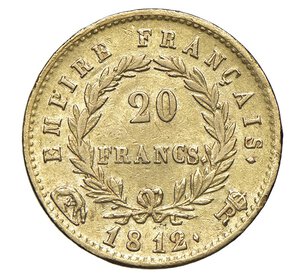 reverse:  NAPOLEONE I  (1804-1814)  20 Franchi 1812  R coronata, Roma   Pagani 92   Mont. 75   Gig. 17   Au   6,41 g   21 mm   R   • Ex Varesi 56/330; la moneta presenta lievi segni di contatto sia sul collo e sia  sulla guancia, originati in zecca. Ottima qualità per l emissione   q.SPL  