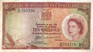 obverse: CARTAMONETA ESTERA - RHODESIA & NYASALAND - Elisabetta II (1952-1966) - 10 Scellini 30/01/1961 Pick 20 R   Stirato. meglio di MB