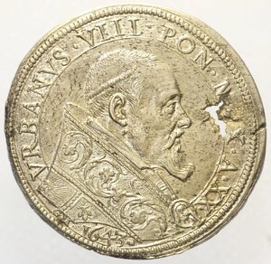 obverse: Urbano VIII (1623-1644) Piastra 1643 An. XXI - AG (g 32,13) Diritto. Effigie del Papa a destra. Rovescio. I semibusti di San Pietro e San Paolo irradiati dalla colomba dello Spirito Santo. Frattura di conio passante. SPL+