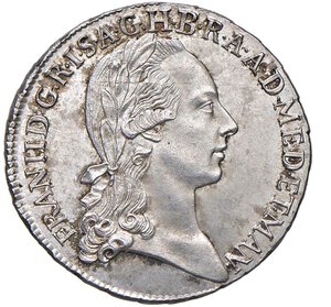 obverse: MILANO - FRANCESCO II (1792-1800) - Lira del Giuramento, 1792
Argento - 6,24 gr.
Dritto: Testa laureata a destra con lunga capigliatura; - Rovescio: Iscrizione sormontata da corona imperiale.
Gigante 24   Rara
Di eccezionale conservazione.
FDC

 Il 21 gennaio 1741, giorno in cui Maria Teresa fu dichiarata duchessa di Milano, il governatore di Milano e dei ducati di Mantova, Parma e Piacenza, Otto Ferdinando conte di Abensberg e di Traun, si recò a ricevere, a nome dell Imperatrice, il giuramento di fedeltà e le chiavi della città. Durante il suo corteo, partito da Porta Romana, furono gettate alla folla ottomila monete d argento appositamente coniate per l evento.
L uso di gettare monete alla folla fu seguito anche da Giuseppe II (il 25 luglio 1781), Francesco II (il 16 settembre 1792), poi - durante il Regno Lombardo Veneto - come Francesco I (il 15 maggio 1815). Ferdinando I, invece, distribuì questo tipo di emissione in occasione della propria incoronazione, avvenuta il 6 settembre 1838.
Mentre questo tipo di emissioni del Ducato di Milano e Mantova, distribuite sotto Maria Teresa, Giuseppe II e Francesco II, sono da considerarsi come delle vere e proprie monete, in quanto presentano diametri e pesi corrispondenti alle monete di analogo valore, quelle del Regno Lombardo Veneto coniate da Francesco I e Ferdinando I sono da considerarsi medaglie o gettoni.  (cit. Gigante, pag. 254)