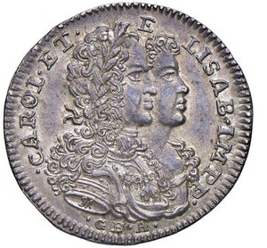 obverse: NAPOLI - CARLO VII D ASBURGO (1711-1734) - 20 grana o Tarì 1716
Argento - 4,41 gr.
Dritto: Busti accollati a destra di Carlo VI laureato, drappeggiato e corazzato, e di Elisabetta di Brunswick. - Rovescio: Figura muliebre galeata, stante di fronte, con lancia e fanciullo in grembo; in basso, alle sue spalle, panoplia d¿armi.
Pannuti Riccio 17   Raro
Bella patina di vecchia raccolta.
SPL-FDC
Carlo VI d Asburgo, secondogenito dell Imperatore Leopoldo I, fu direttamente impegnato come pretendente al trono nella guerra per la successione al regno di Spagna, che travagliò l Europa nel primi anni del XVIII secolo.
Dopo essersi impossessato del regno, le forze austriache al comando del Maresciallo Von Martinitz occuparono Napoli nel 1707.
Con il Trattato di Rastadt, del 1714, Carlo VI fu costretto a riconoscere il nuovo Re di Spagna, ma nel contempo gli fu confermata la sovranità sui possedimenti in Italia.
Il periodo della dominazione austriaca è da considerarsi positivo per le migliorate condizioni sociali ed economiche, tuttavia larga parte della popolazione non amava i nuovi padroni di indole tanto diversa dalla latina.
Il dominio austriaco ebbe termine l 8 maggio 1734 con l entrata a Napoli di Carlo di Borbone.