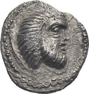 obverse: Cilicia. Nagidos. Circa 400-380 BC. Obol (Silver, 10.02 mm, 0.74 g). Head of Pan to right. Rev. ΝΑΓΙ Head of Dionysos to right. Göktürk 4. SNG Levante 4-5. SNG France 16-18. A beautiful coin of extremely fine style. Some roughness, otherwise, Extremely Fine.