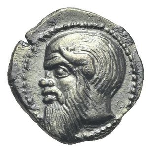 obverse: Sicily. Katane. Circa 461-450 BC. Litra (Silver, 11.50 mm, 0.94 g). Head of Silenos to left, with a long beard extending through the dotted border. Rev. ΚΑΤ - ΑΝΕ Winged thunderbolt, two shields flanking. Boehringer, Kataneische Series I, Li.4. Mirone 21. HGC 2, 588. Toned. Extremely Fine. Rare.