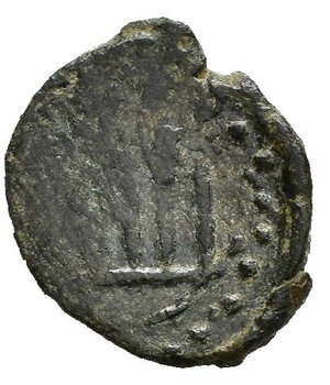 reverse: BARI. Ruggero II (1139-1154). Follaro. AE (g 0,77). S. Demetrio stante di fronte, regge lancia. R/ Leggenda pseudo-cufica. MIR 133. qBB