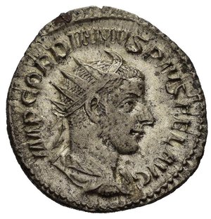 obverse: GORDIANO III (238-244). Roma. Antoniniano. AR (3,65 g). D/ IMP GORDIANVS PIVS AVG,  busto radiato, drappeggiato e corazzato a destra, visto di spalle; R/ AETERNITATI AVG, Sol stante, regge un globo e solleva la destra in segno di saluto. RIC IV 83. mBB. nr.reg.601/24