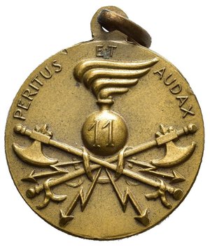 reverse: Medaglie Italiane – Regno d’Italia - Vittorio Emanuele III (1900-1945) - Ventennio Fascista - Genio.  Medaglia portativa, con appiccagnolo ed anello, emessa a ricordo del 11° Reggimento Genio nel 1928. Al dritto personificazione del Genio stante verso s. intorno legenda 11° REGG GENIO 1° MARZO 1928 (VI) in basso a s. S.J. emblema del Corpo del Genio con scritta 11 intorno legenda PERITUS ET AUDAX. Opus Stefano Johnson. Realizzata in bronzo (AE) (Ø 21.8mm, 6.8g.). Non censita nei testi da noi consultati. Conservazione BB/SPL. Il 1º marzo 1928 si forma l 11º Reggimento Genio su un battaglione zappatori-minatori, un battaglione telegrafisti, un battaglione teleferisti e tre colombaie. All inizio del secondo conflitto, il reggimento diviene centro di mobilitazione e tramite il deposito costituisce numerosi reparti delle varie specialità (fra i quali il III battaglione misto 