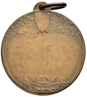 reverse: Medaglie Italiane – Regno d’Italia - Vittorio Emanuele III (1900-1945) - Ventennio Fascista – Premio. Medaglia portativa con appiccagnolo ed anello del tipo premiale. Al dritto figura maschile a d. che abbraccia un fascio littorio. Al rovescio spazio dedicatorio centrale, in alto scudetto e rami di piante, in basso rami. Realizzata in bronzo (AE) (Ø 36.9mm, 23.6g). Manca in Casolari. Conservazione BB.  