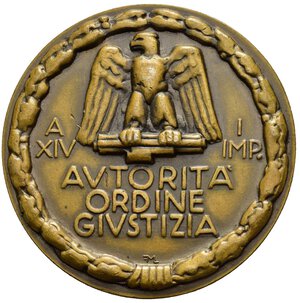 reverse: Medaglie Italiane – Regno d’Italia - Vittorio Emanuele III (1900-1945) - Ventennio Fascista – Benito Mussolini - Autorità Ordine Giustizia – Molto Rara (RR). Medaglia statica di grande formato. Al dritto entro rami d alloro legati da fascine in basso: testa di Mussolini a sx sotto: LPG. Al rovescio entro rami d alloro legati da fascine in basso: Aquila su fascio ai lati: A = XIV _ I = IMP. sotto: AVTORITA  = ORDINE = GIVSTIZIA in basso monogramma: FML. Riferimenti Casolari XIV-1 (per il tipo), la moneta censita è di diametro nettamente inferiore, questa variante proposta non è presente – con questo diametro – neanche nell’opera IERI HO VISTO IL DUCE volume II. Conservazione SPL. Opus Lorioli Milano. Realizzata in bronzo (AE) (Ø 50mm, 63.9g). 