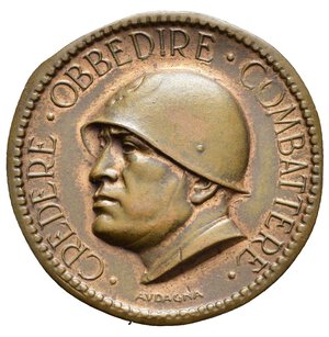 obverse: Medaglie Italiane – Regno d’Italia - Vittorio Emanuele III (1900-1945) - Ventennio Fascista – Benito Mussolini – FGC - Torino. Medaglia statica realizzata nel 1936 per i Campionati Nazionali Giovanili Fascisti. Al dritto. CREDERE • OBBEDIRE • COMBATTERE • testa elmata di Mussolini a sx sotto: AVDAGNA. Al rovescio CAMPIONATI • NAZIONALI • GIOVANI • FASCISTI = • I • VI • SETT. • affiancati: scudo con FGC su fascio e Stemma della Città di Torino su ramo di quercia sotto: A. = XIV nel campo a dx: C LOMBARDI. Riferimenti Casolari XIV-101.  Conservazione SPL. Opus Virgilio Audagna. Realizzata in bronzo (AE) (Ø 32.1mm, 12.5g).