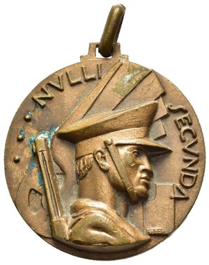 obverse: Medaglie Italiane – Regno d’Italia - Vittorio Emanuele III (1900-1945) - Ventennio Fascista – Milizia Ferroviaria – MVSN – Milano – Rara (R). Medaglia portativa con appiccagnolo ed anello dai forti rilievi. Al dritto _ • • • NVLLI _ SECVNDA busto di Miliziano a dx su ruota alata e fascio verticale con lama a dx sulla lama a dx: AFFER.  Al rovescio nel campo: II LEGIO = MILIZIA = FERROVIARIA = MILANO sotto: Stemma di Milano tra fasci verticali con lame divergenti. Manca nei riferimenti da noi consultati. Conservazione SPL (punti di ossidazione). Opus Costantino Affer. Realizzata in bronzo (AE) (Ø 32mm, 17.3g). 