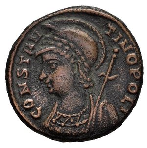 obverse: COMMEMORATIVE DI COSTANTINOPOLI. Nicomedia. Nummus centennionalis. AE (2,17 g). D/ CONSTANTINOPOLI, busto di Costantinopoli elmato e drappeggiato a sinistra, regge scettro; R/ anepigrafo, Vittotia incedente su prua di nave regge scettro e si appoggia ad uno scudo. RIC VII 196. BB. nr.reg.595/24