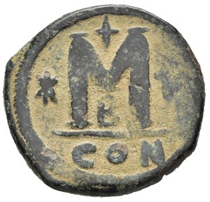 reverse: GIUSTINIANO I (527-565). Follis per Costantinopoli. AE (g 17,31). Busto diademato, drappeggiato e corazzato a destra. R/ Grande M tra stella e croce; croce sopra; B sotto; CON all esergo. MIBE 84; DOC 28b; Sear 158. qBB. Nr.Reg. 612/24