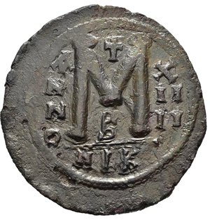 reverse: GIUSTINIANO I (527-565). Follis per Nicomedia. AE (g 23,52). Datato anno 14 (540/1 d.C.). Busto coronato, diademato e corazzato di fronte, regge globo crucigero e scudo decorato con cavaliere; croce a destra. R/ Grande M tra A/N/N/O e data; croce sopra; B sotto; NIK all esergo. MIBE 114; DOC 118a var. (officina); Sear 201. BB+. Nr.Reg. 612/24