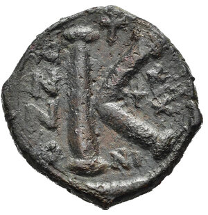 reverse: GIUSTINIANO I (527-565). Mezzo Follis per Nicomedia. AE (g 8,59). Datato anno 30(?). Busto coronato, diademato e corazzato di fronte, regge globo crucigero e scudo decorato con cavaliere; croce a destra. R/ Grande K tra A/N/N/O e data; croce sopra; NI sotto. MIBE 116a; Sear 203. BB. Nr.Reg. 612/24