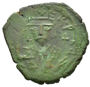 obverse: FOCA (602-610). Mezzo Follis per Cizico. AE (g 5,17). Datato anno 2 (603/4 d.C.). Busto coronato frontale in abito consolare, regge mappa e croce. R/ XX sormatato da croce; anno a destra; KYZA all esergo. MIBE 79; DOC 79a; Sear 670. BB+. Nr.Reg. 612/24