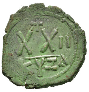 reverse: FOCA (602-610). Mezzo Follis per Cizico. AE (g 5,17). Datato anno 2 (603/4 d.C.). Busto coronato frontale in abito consolare, regge mappa e croce. R/ XX sormatato da croce; anno a destra; KYZA all esergo. MIBE 79; DOC 79a; Sear 670. BB+. Nr.Reg. 612/24