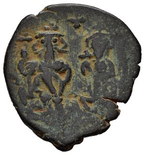 reverse: COSTANTE II con COSTANTINO IV (641-668). Follis per Costantinopoli. AE (g 6,54). Data illegibile. Figure coronate frontali di Costante, in abito militare con croce lunga, e Costantino con clamide e globo crucigero; croce sopra. R/ Grande M tra A/N/N/O e [data]; Δ sotto; CON all esergo. MIB 174b; Sear 1010. Ribattuto. qBB. Nr.Reg. 612/24