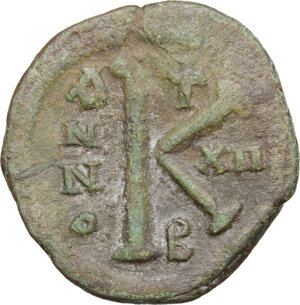 reverse: Justinian I (527-565).. AE Half Follis, Constantinople mint