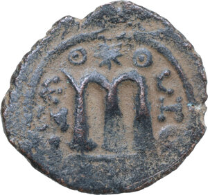 reverse: Arab-byzantine, Umayyad Caliphate. time of  Abd al-Malik ibn Marwan (AH 65-86 / AD 685-705). . AE Fals. Hims (Emesa) mint. Struck circa 685-690s