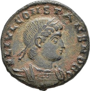 obverse: COSTANTE I, Cesare (324-337). Antiochia. Nummus. 335-337. AE (1,90 g). D/ FL IVL CONSTANS NOB C, busto laureato e corazzato a destra, con drappeggio sulla spalla; R/ GLORIA EXERCITVS, due soldati armati stanti con lancia e scudo, tra di loro un insegna; in esergo SMANH. RIC VII 111. mBB nr.reg.592/24