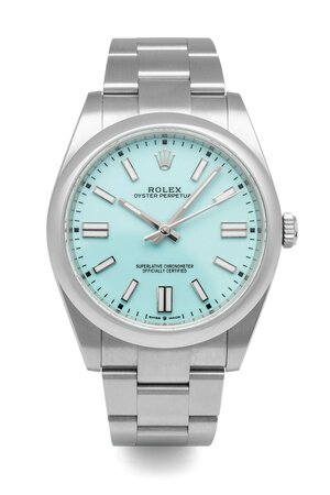 obverse: ROLEX Oyster Perpetual - Tiffany Dial- Movimento con calibro 3230 a carica automatica. Referenza 124300. Seriale alfanumerico. Cassa in acciaio con diametro da 41mm. Dial turchese (tiffany). Bracciale oyster in acciaio con chiusura deployante originale. Vetro zaffiro.  Anno 2021. Serie recente, da poco uscita di produzione. Orologio nuovo, forse solo messo a misura e provato, venduto con corredo completo composto da scatola, controscatola, garanzia e libretto d’istruzioni. Perfettamente funzionante. 