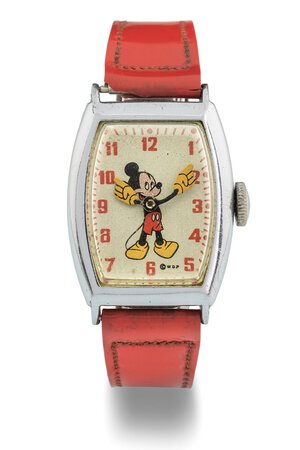 obverse: US Time Mickey Mouse, anni 40 Cassa tonneau in metallo cromato. Quadrante argenté raffigurante Mickey Mouse, sfere a forma di braccia, numeri arabi dipinti. Movimento a carica manuale. Cinturino in pelle. Dimensioni: 33 x 27 mm.Orologio non funzionante, revisione necessaria.