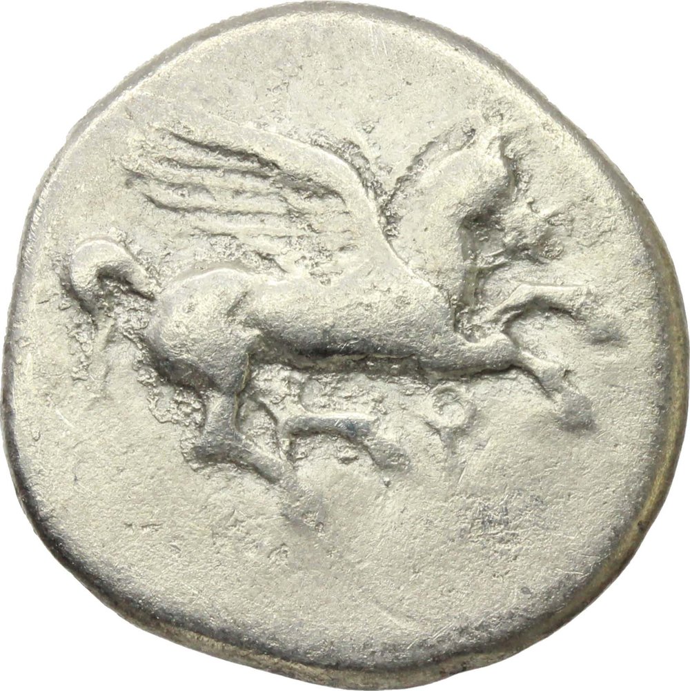 Greece. Corinth. AR Stater, circa 405-345 BC. Obv. Pegasos flying right; koppa below. Rev. Helmete foto 1
